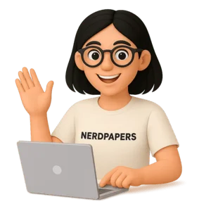 Smiling writer waving while working on laptop